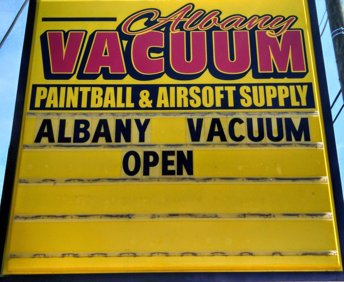 Albany Vacuum Repair & Sales / L & M Sports sign